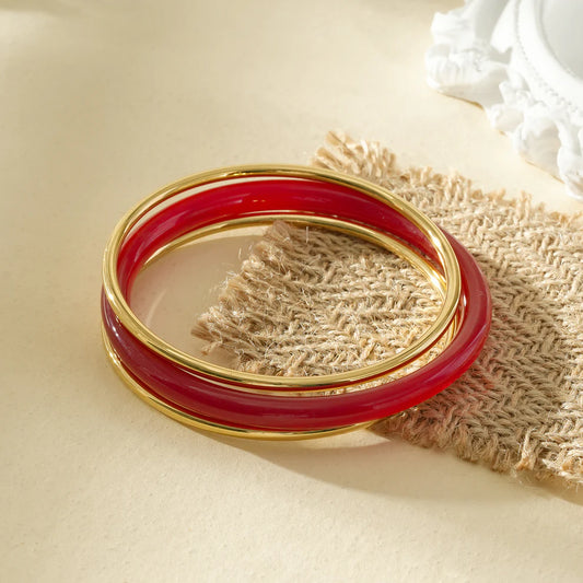 Bracelet 3 Jonc 2 Anneaux Doré et 1 Anneau Résine Rouge