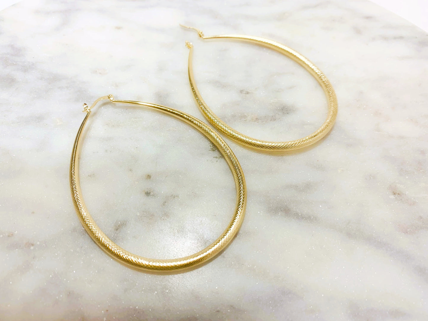 Boucles d'Oreilles Créoles Ovales vu à plat