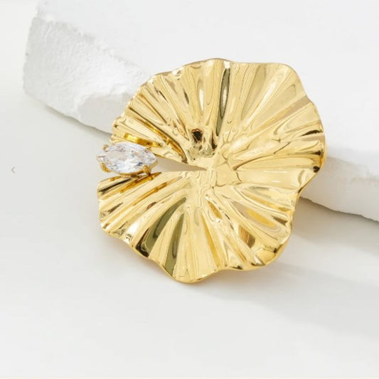 Broche Dorée Disque Ondulé et Strass Blanc