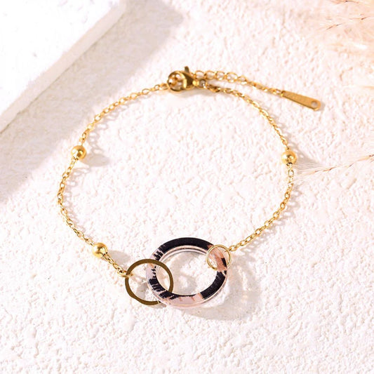 Bracelet Chaine Doré Double Cercle Entrelacé Motif Leopard