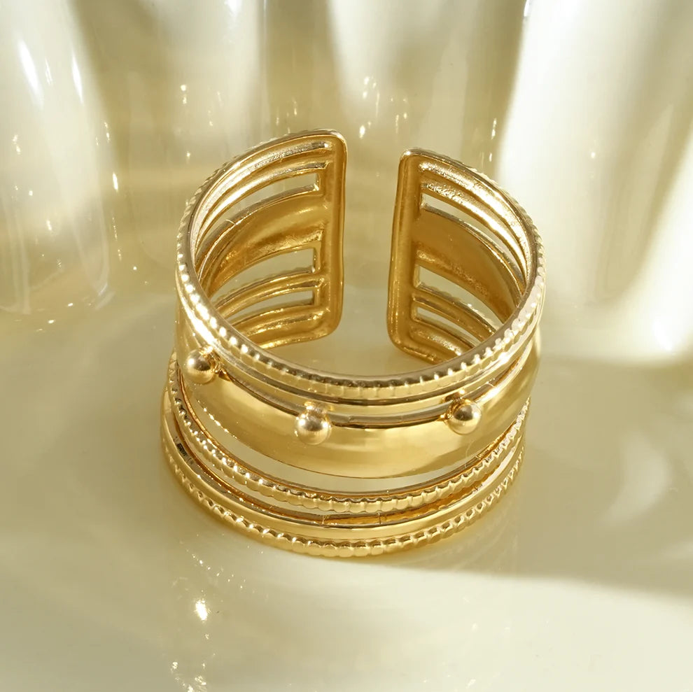 Bague multi-rangs ajourés et perlés Doré