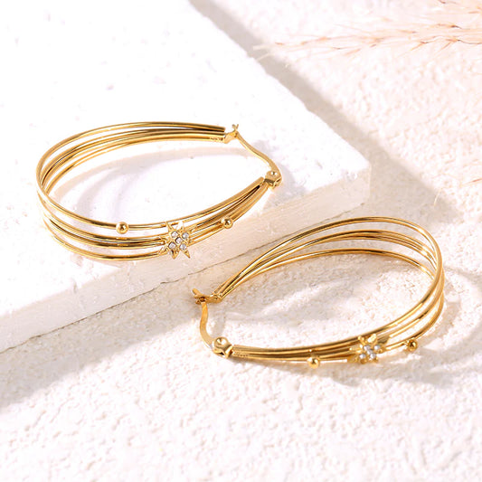 Boucles d'Oreilles Créoles 4 Anneaux Reliés et Etoiles Strass Blancs