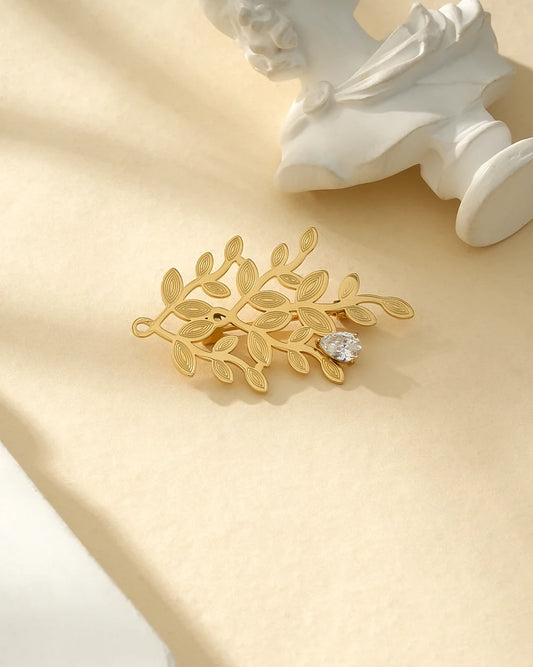 Broche Doré Feuillage et Strass Blancs
