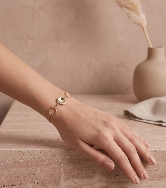 Bracelet Deux Anneaux et Pastille centrale en Acier Inoxydable Doré Porté