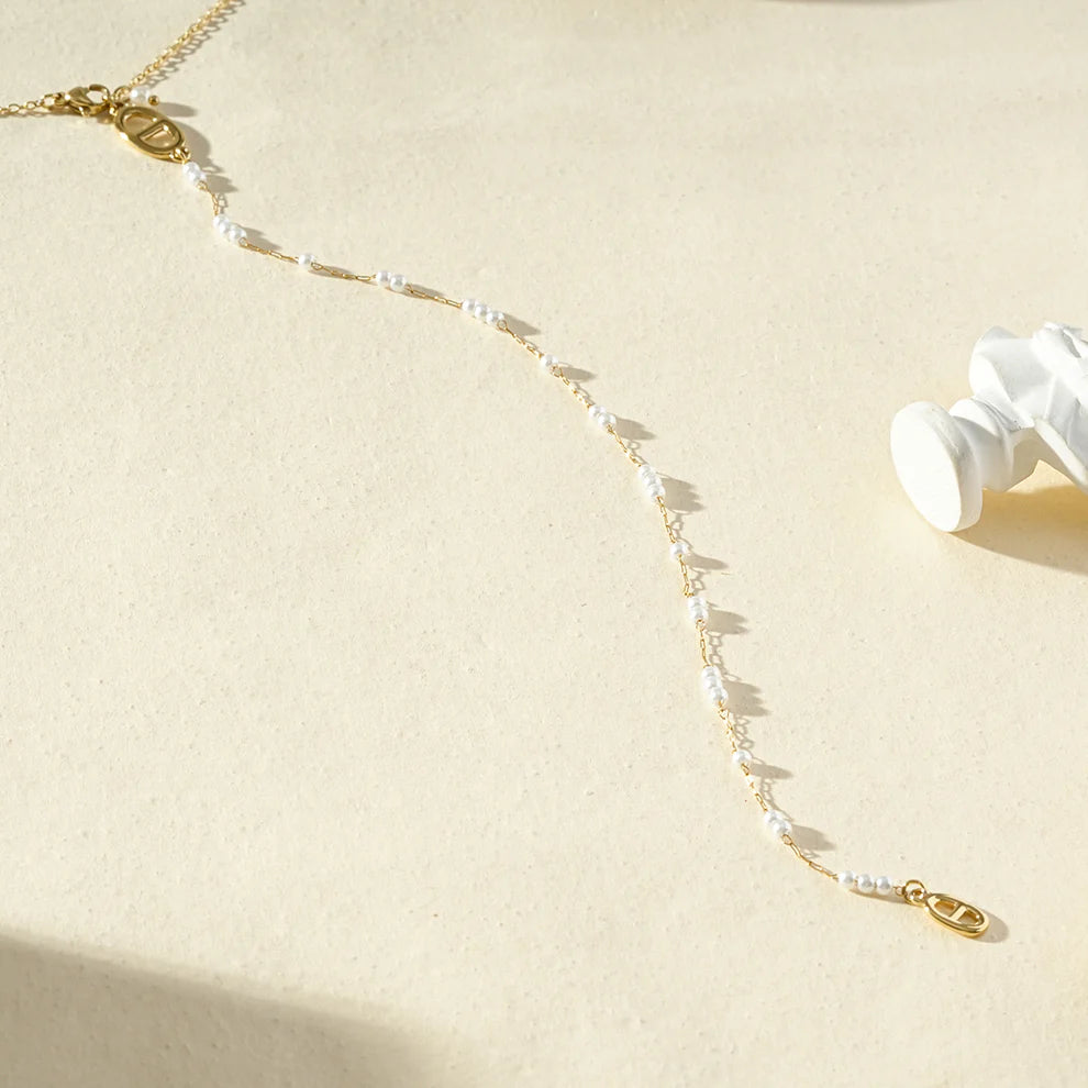 Collier de Dos Doré Maille Marine et Perles