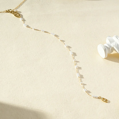 Collier de Dos Doré Maille Marine et Perles