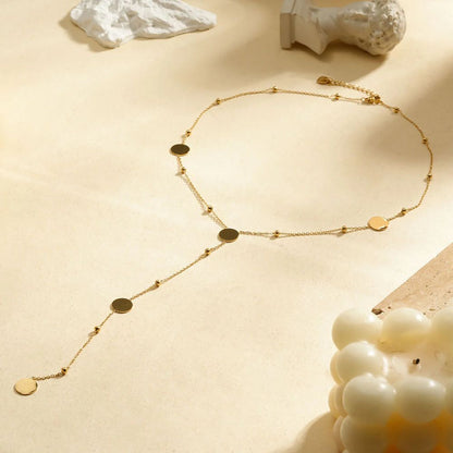 Collier Sautoir Cavate Billes et Disques Doré