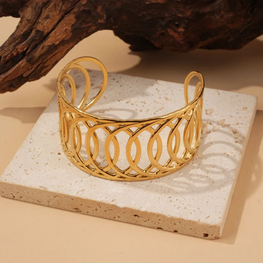 Bracelet jonc manchette ouvert au design géométrique en acier inoxydable doré