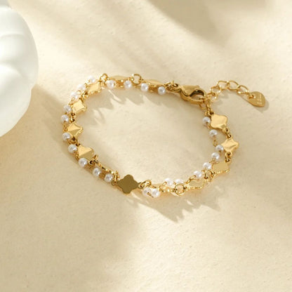 Bracelet double chaine perles et trèfles 