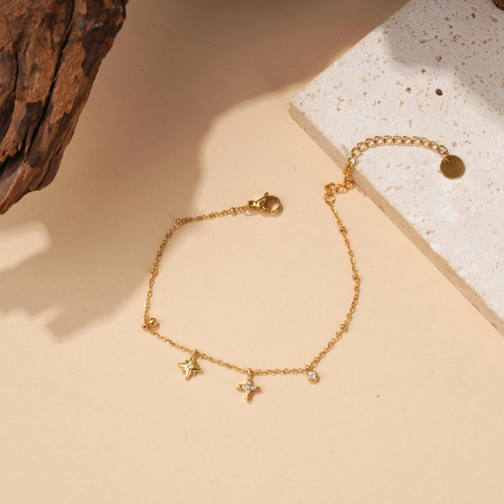 Bracelet chaîne fine composé de constellation d'étoiles strassé en acier inoxydable doré