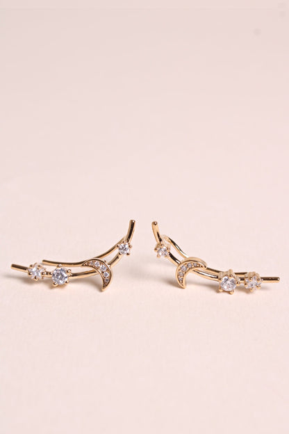 Boucles Montantes dessus d'oreilles étoiles et strass vu de face